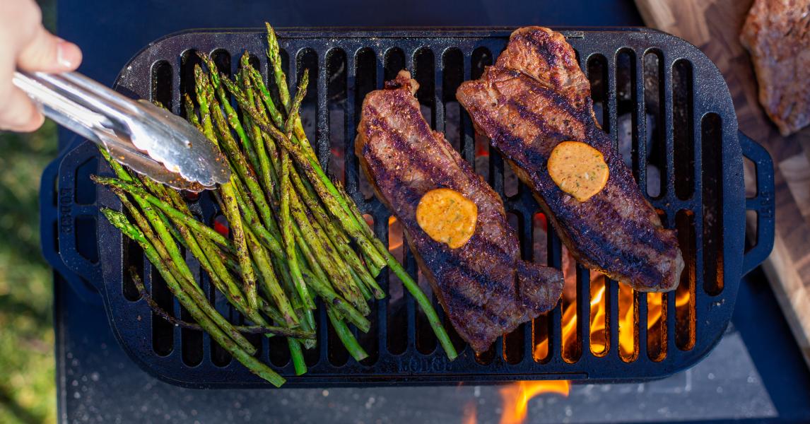 Grilled New York Strip Steaks with Harissa Butter
