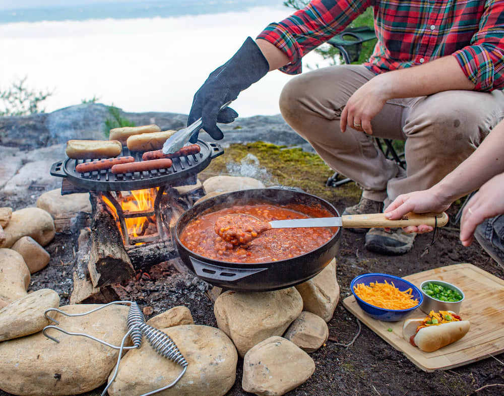 Cook-It-All being used at campsite to cooking hot dogs and make chili