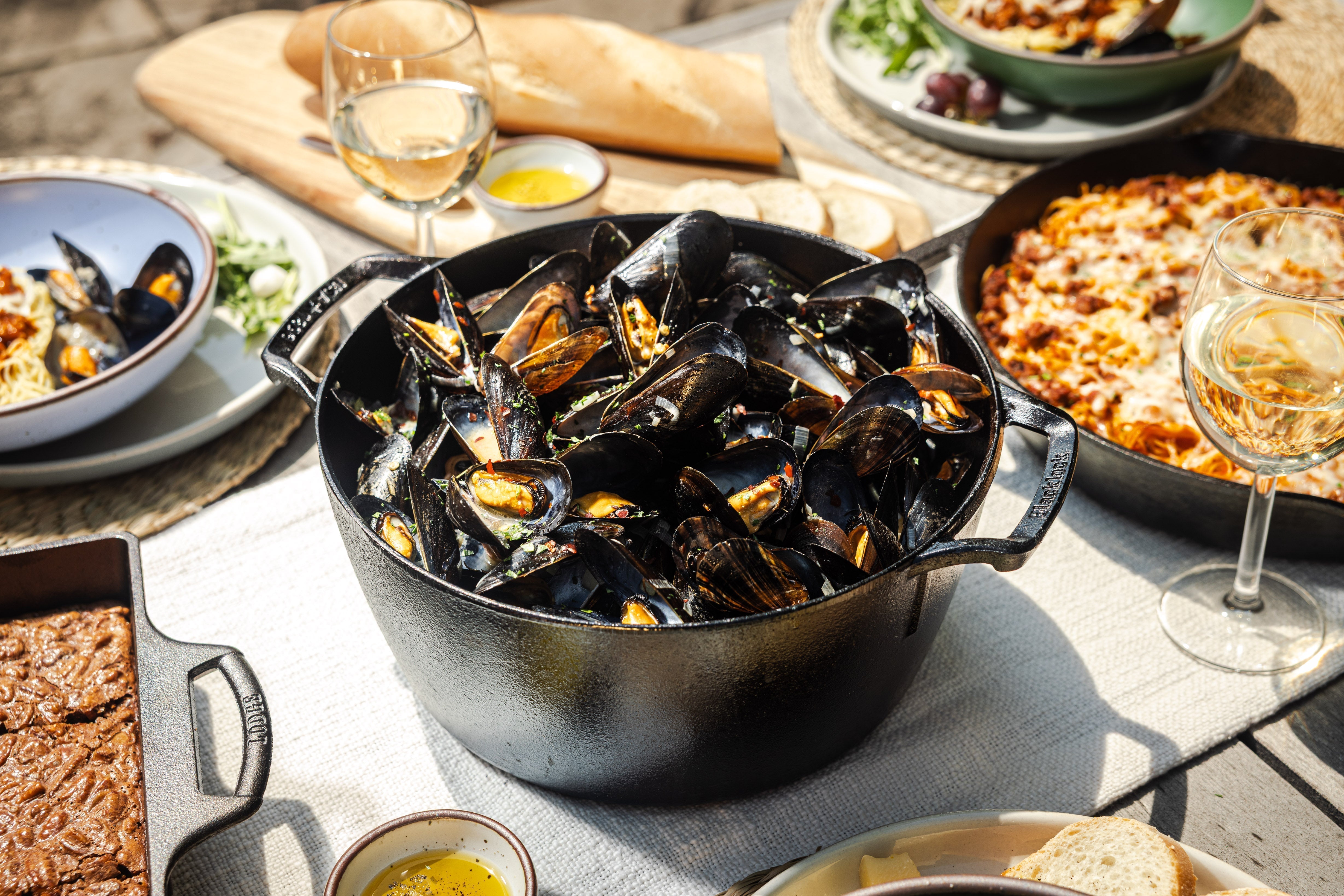 Cast Iron dutch oven with roasted mussels