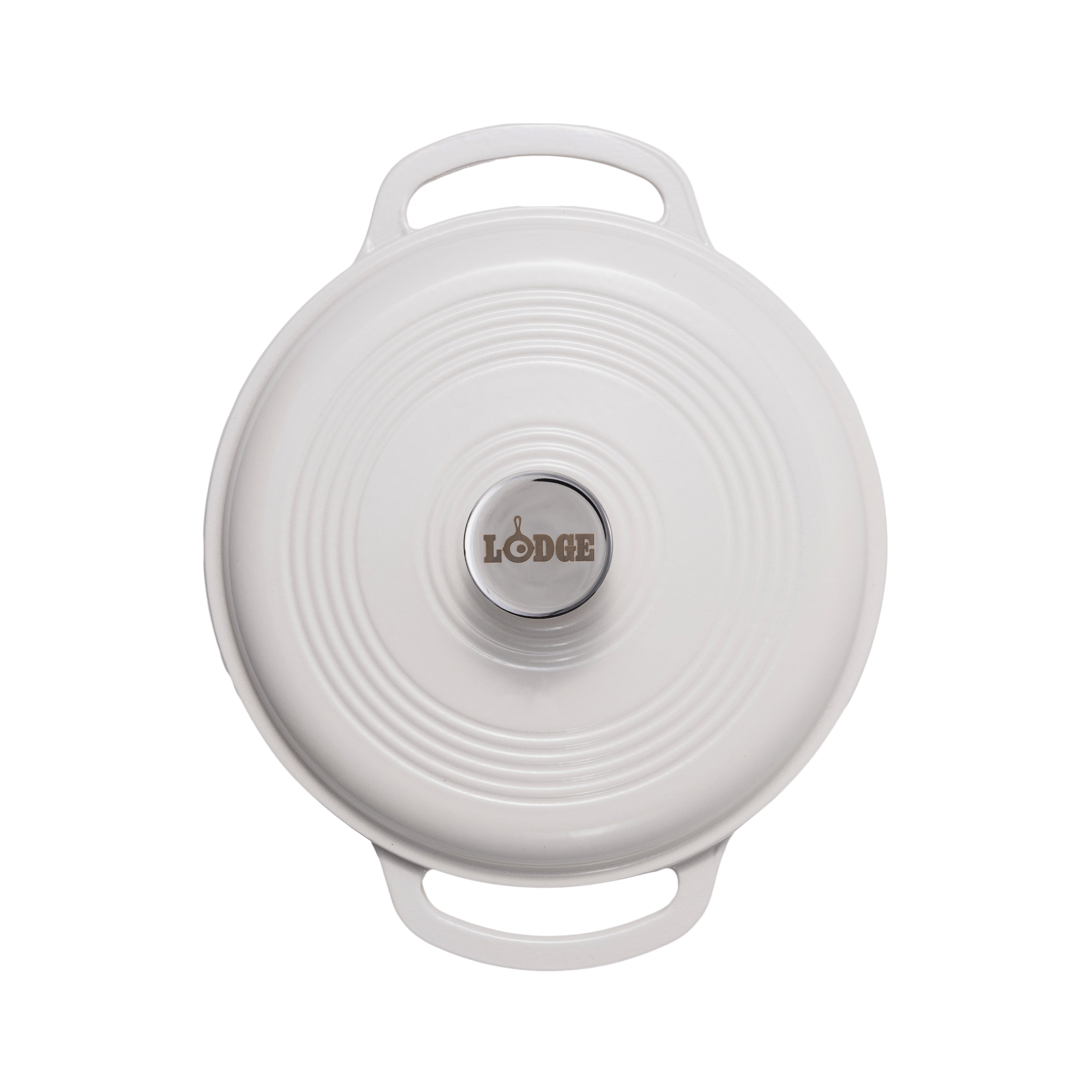 A white Lodge cast iron Dutch oven shown from a top-down view, featuring a circular lid with concentric ridges, two side handles, and a silver-colored center knob with the Lodge logo.