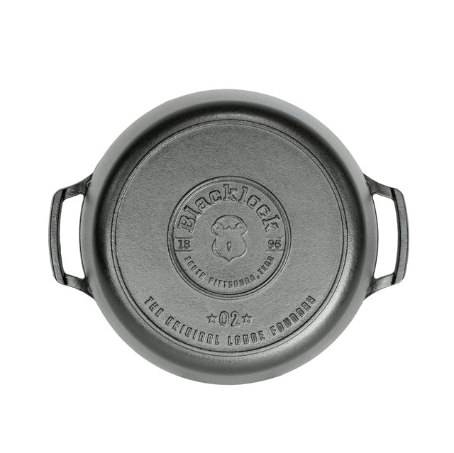 Bottom of dutch oven featuring Blacklock logo.