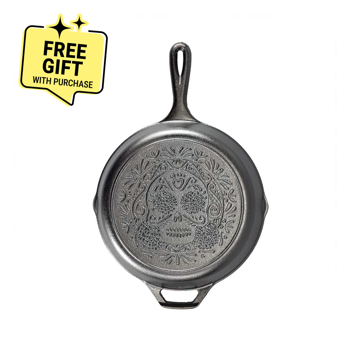 Black cast iron skillet with sugar skull design engraved on back. Featuring a badge saying "Free Gift with Purchase".