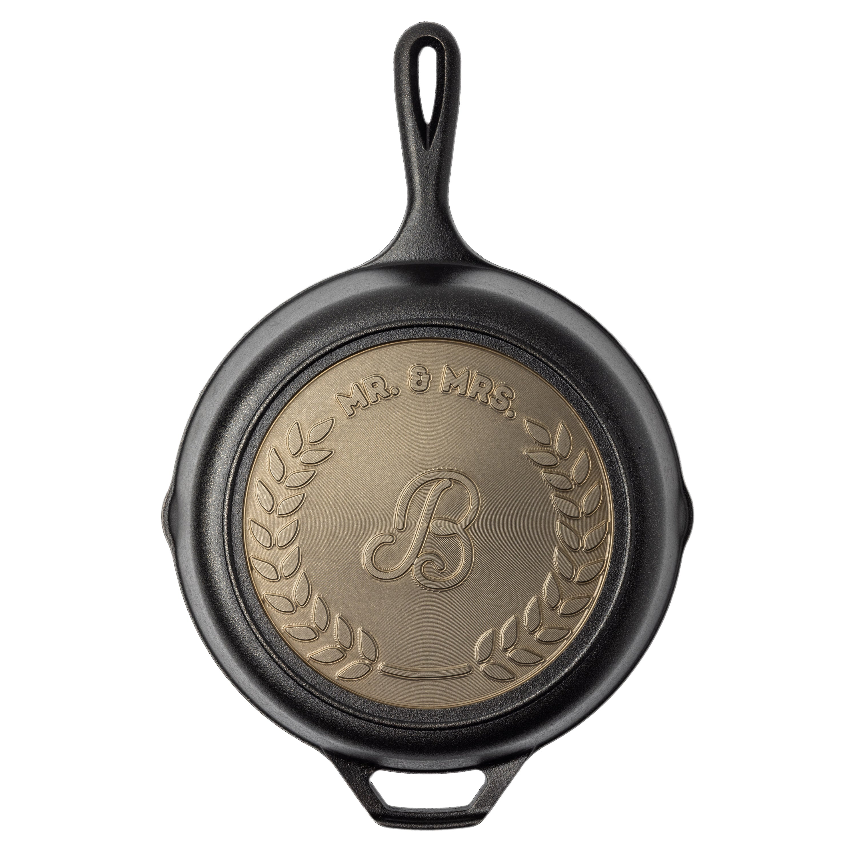 Black cast iron skillet with 'Mr. & Mrs.' and a 'B' emblem on a white background