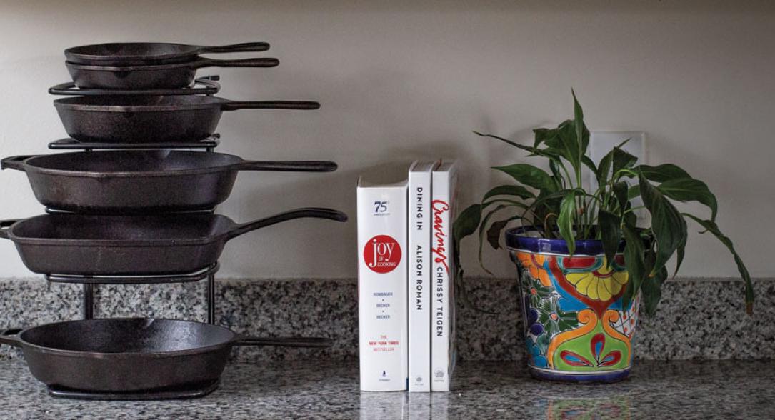 Skillets stored on counter storage rack