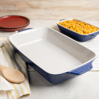 Indigo stoneware baking dish with a dish of Macaroni and cheese.