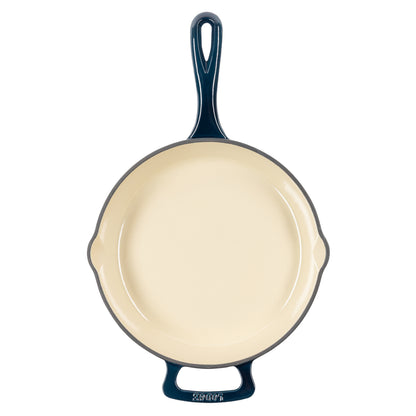 A top down view of skillet showing cream interior and 2 pour spouts, with a long handle and assist handle on each side.