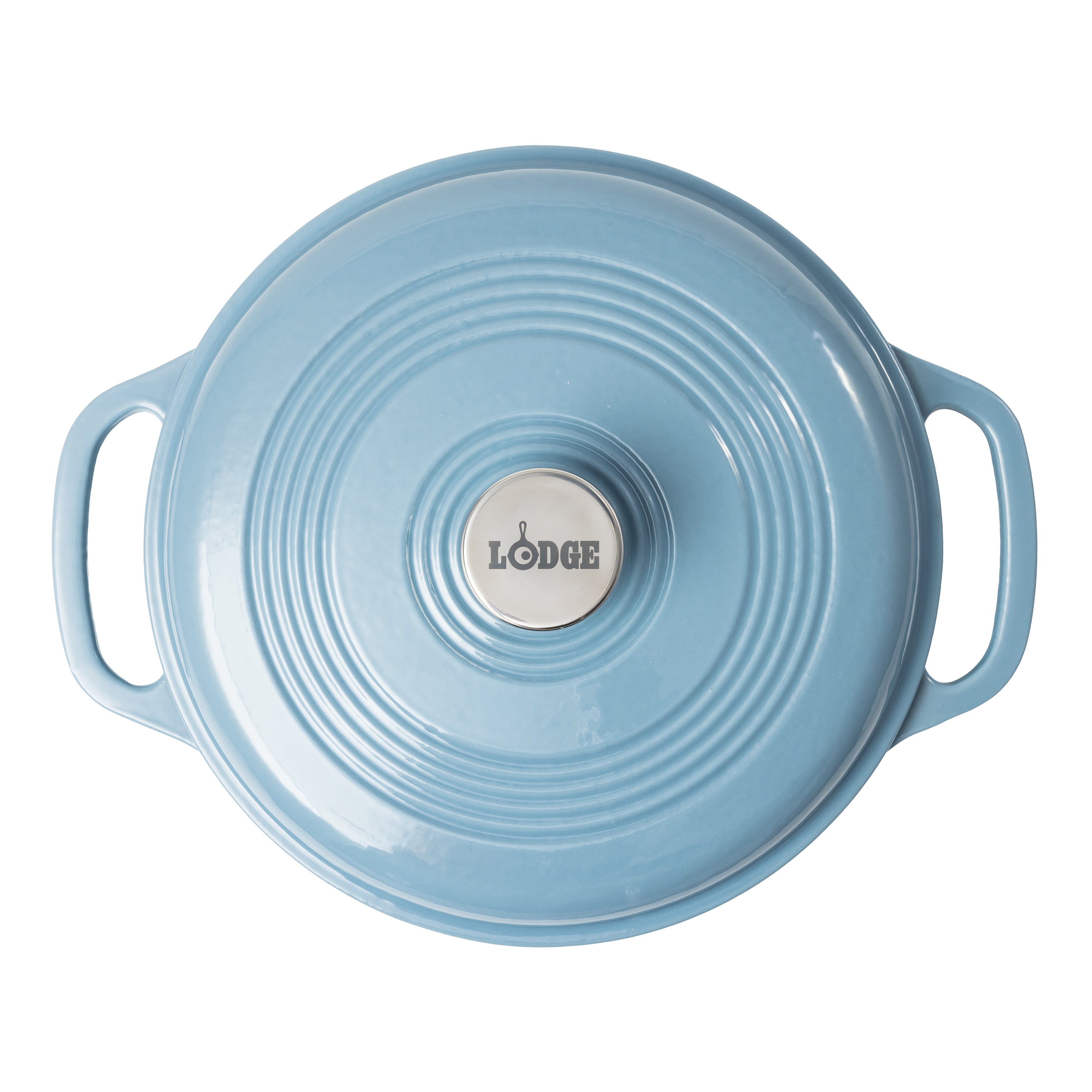 A blue Lodge cast iron Dutch oven shown from a top-down view, featuring a circular lid with concentric ridges, two side handles, and a silver-colored center knob with the Lodge logo.