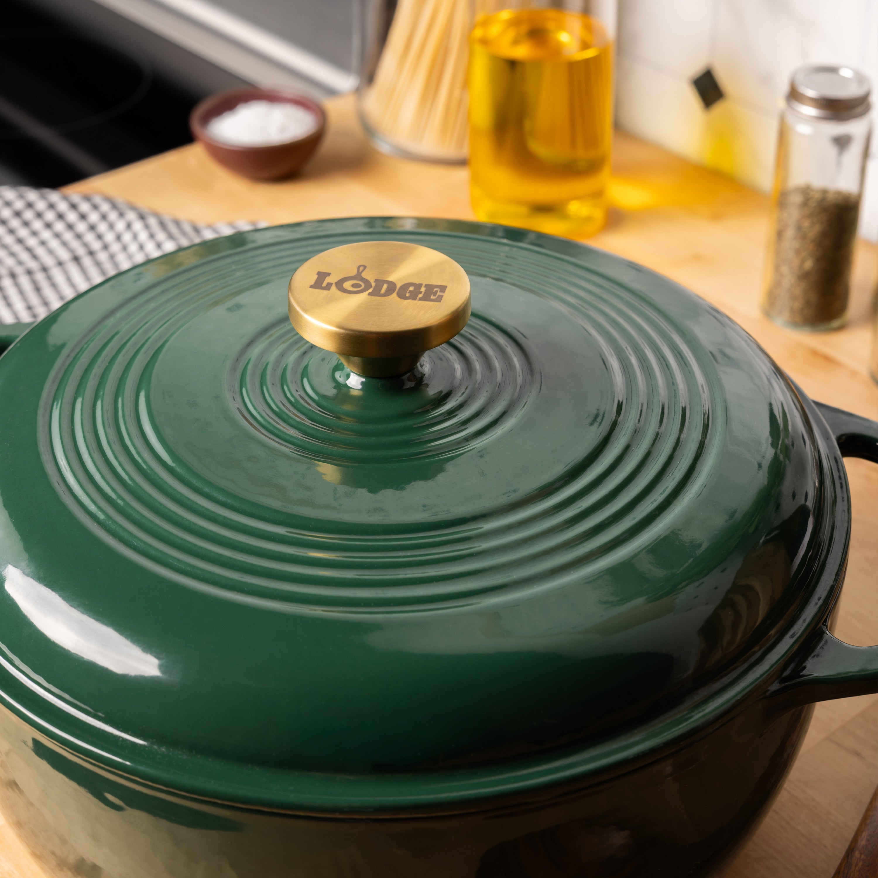 Green Lodge cookware pot with lid on a kitchen counter