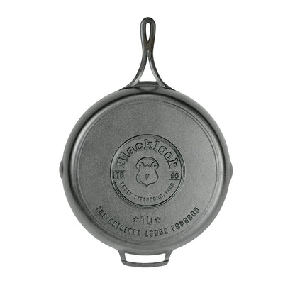 A cast iron skillet shown from the back, featuring circular embossed logo for 'Blacklock'.