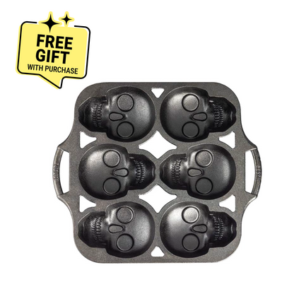 Mini cake pan with 6 skull shaped cups. Featuring a badge saying "Free Gift with Purchase".