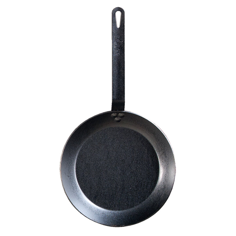 Lodge Carbon Steel Skillet: Honest 10-Inch Cooking Review Lodge CRS10 carbon steel skillet product-only cooking surface detail