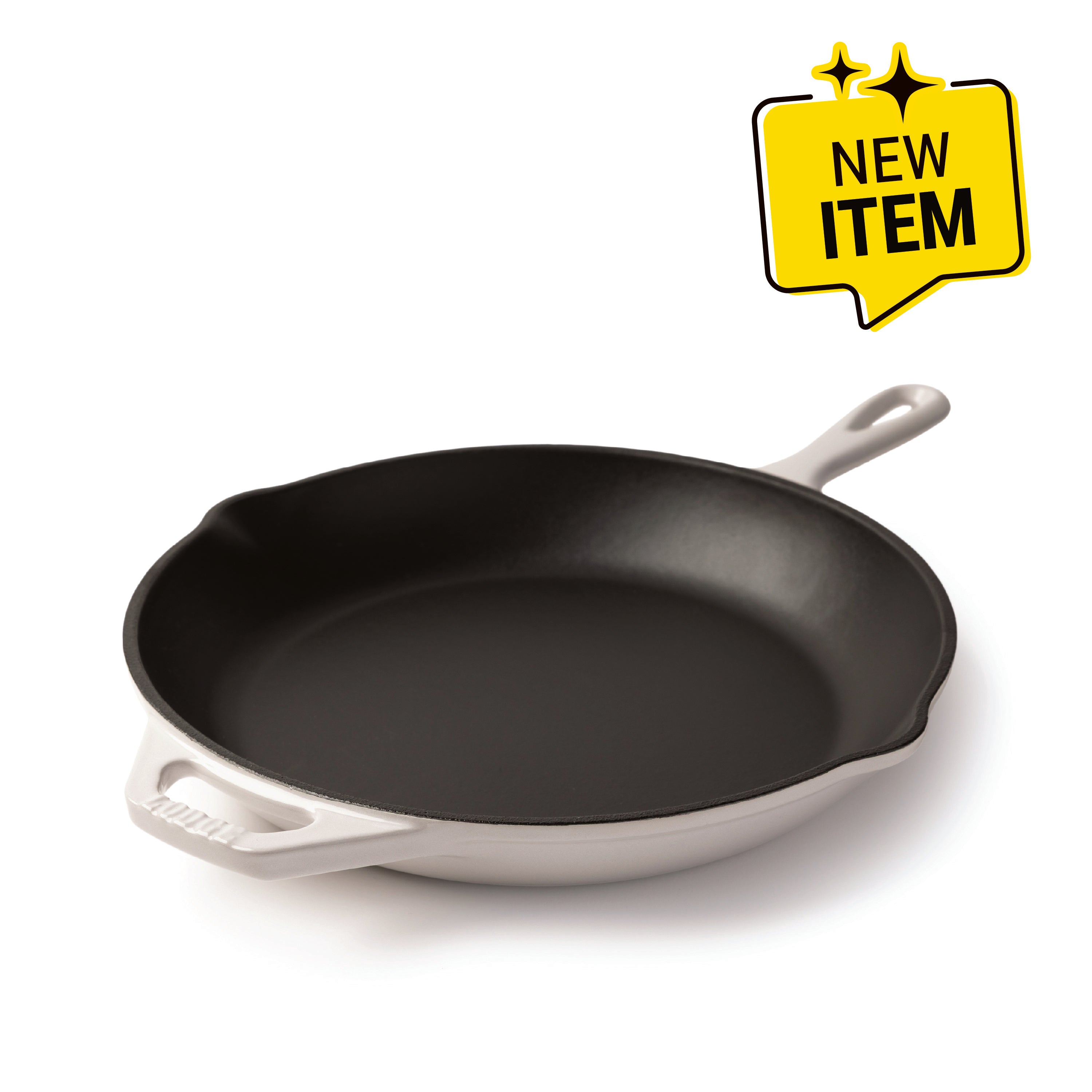 A Lodge enameled cast iron skillet with a black interior and a white exterior, shown on a white background with a yellow 'NEW ITEM' badge in the top right corner.