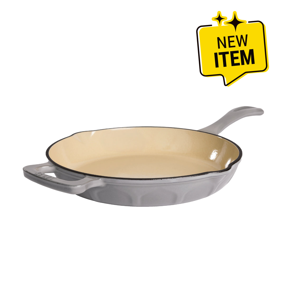 A gray enameled cast iron skillet with a cream-colored interior and a black rim, shown from a three-quarters angle on a white background. A badge saying "New Item" is displayed in top corner.