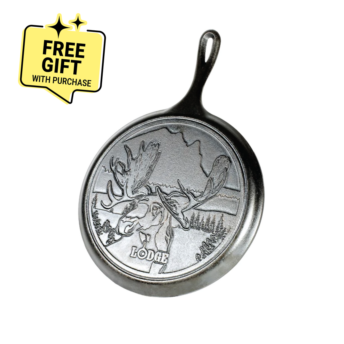 A round cast iron griddle with a moose and mountain landscape design and the word 'LODGE' on it. Featuring a badge saying "Free Gift with Purchase".