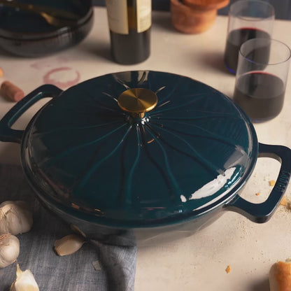Close-up view of braiser sunburst design.