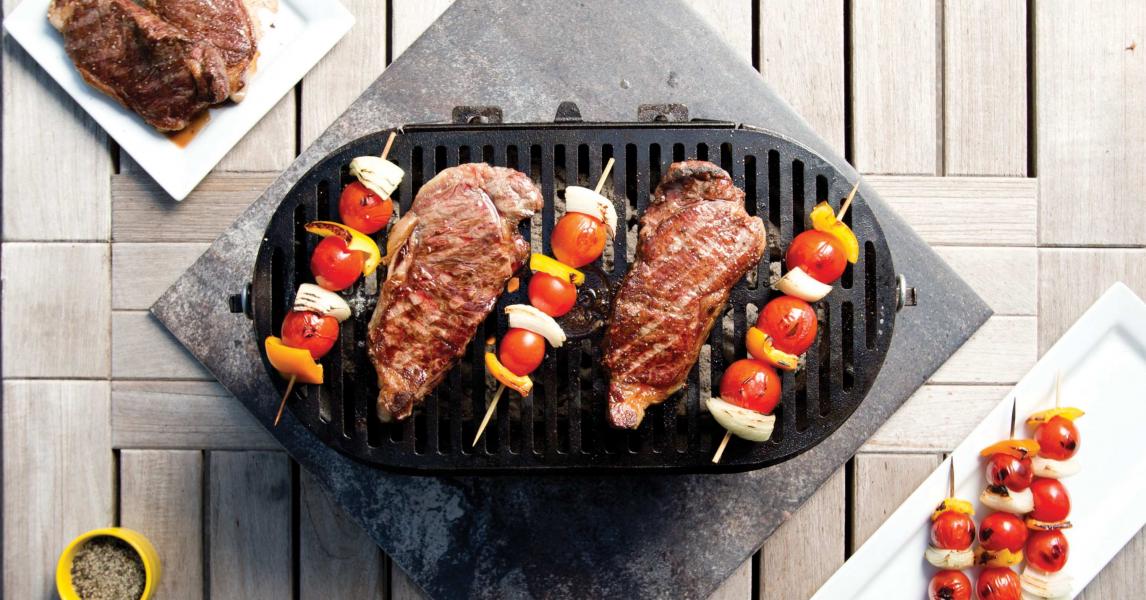 https://www.lodgecastiron.com/sites/default/files/styles/recipe_hero__tombras_large/public/canto/2019-09/L410-steak%26skewers-over_B9R8641.jpg?h=11d9ef2e&itok=xppCpDd1