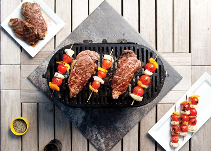 https://www.lodgecastiron.com/sites/default/files/styles/view_slider__tombras_extra_small_2x/public/canto/2019-09/L410-steak%26skewers-over_B9R8641.jpg?h=11d9ef2e&itok=UNx0ZL95